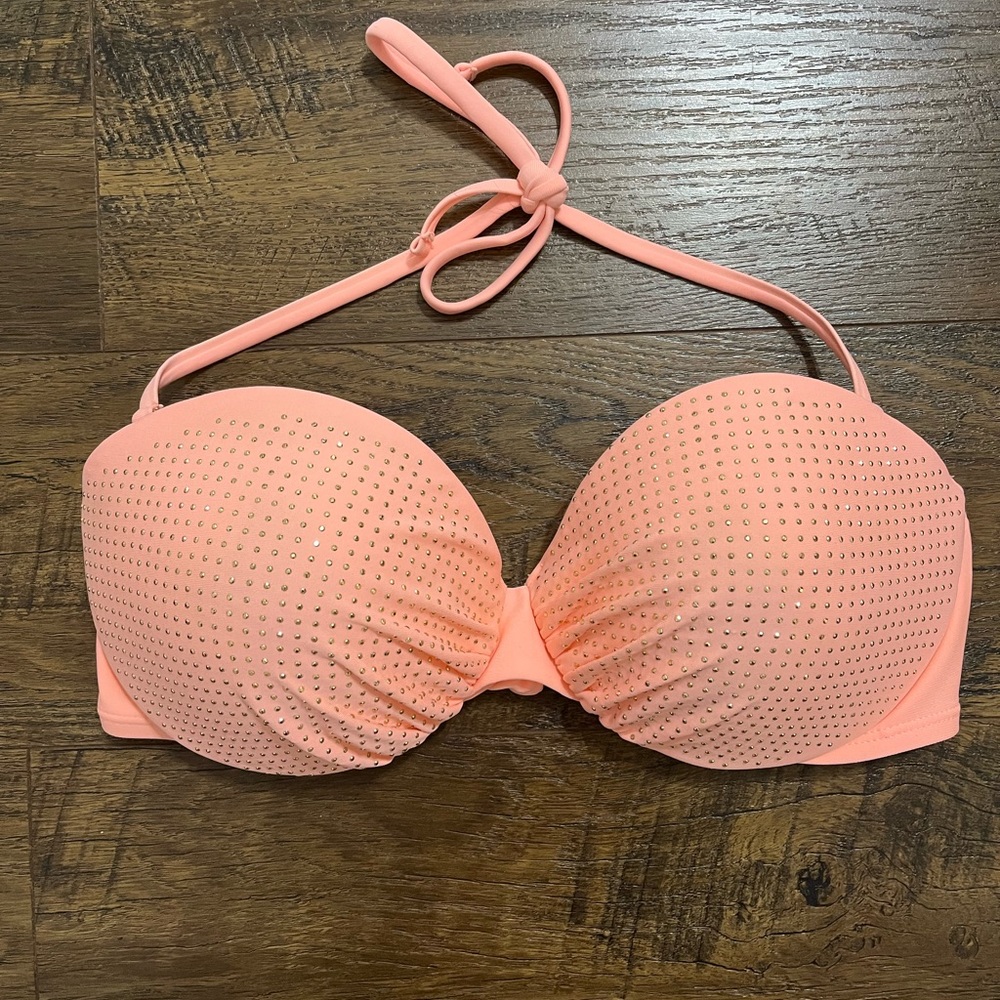 Selling a coral bikini top, size XL. The top has gold rhinestone embellishments.